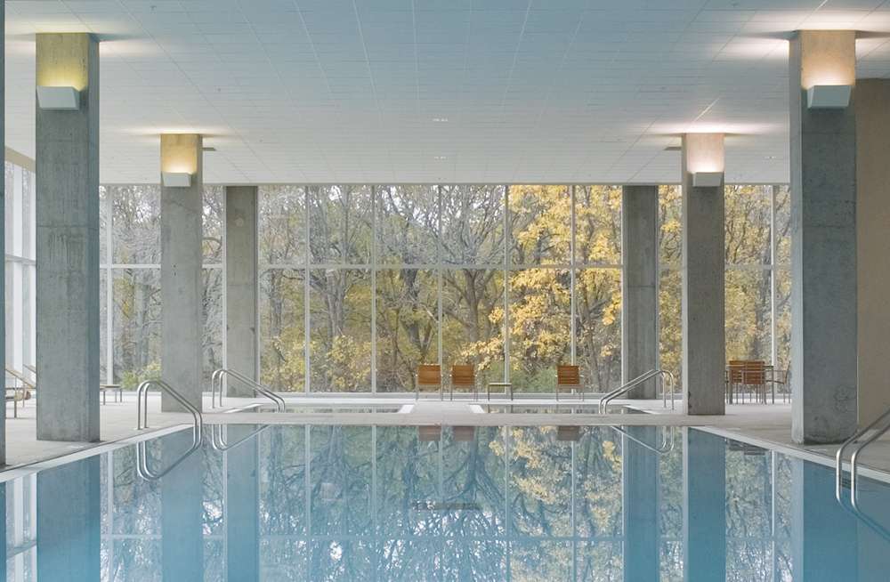 The indoor swimming pool & twin spas at the Optima Old Orchard Woods luxury apartments in Skokie, Illinois.