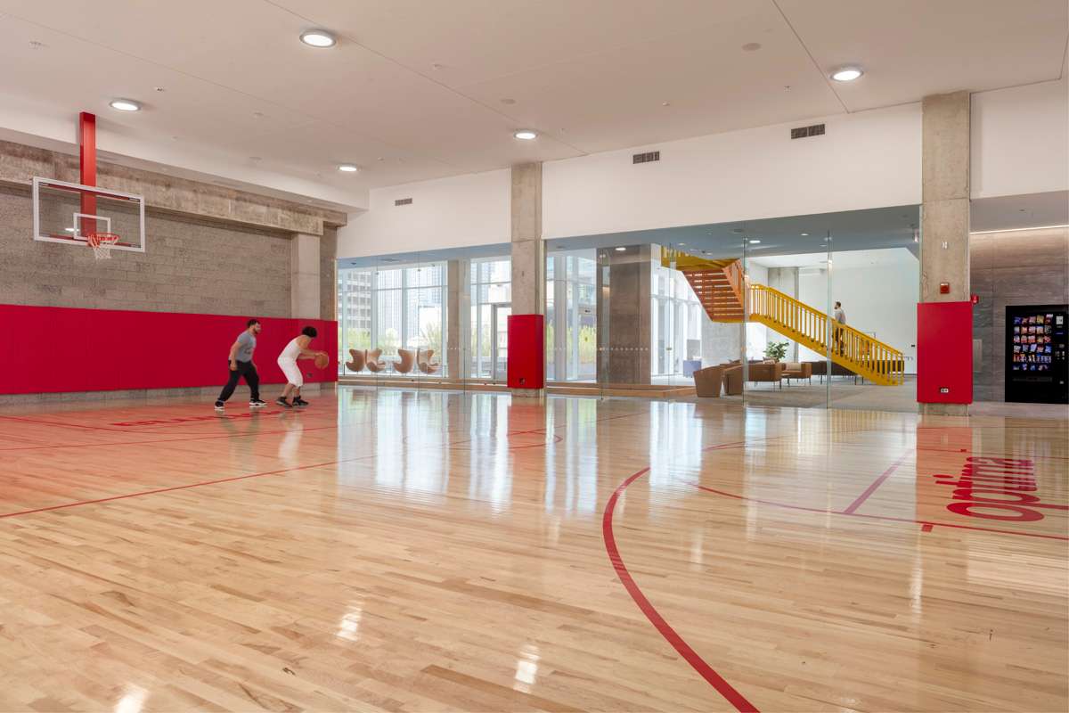 The indoor basketball court at the Optima Signature luxury apartments in Chicago, designed by David Hovey Sr.